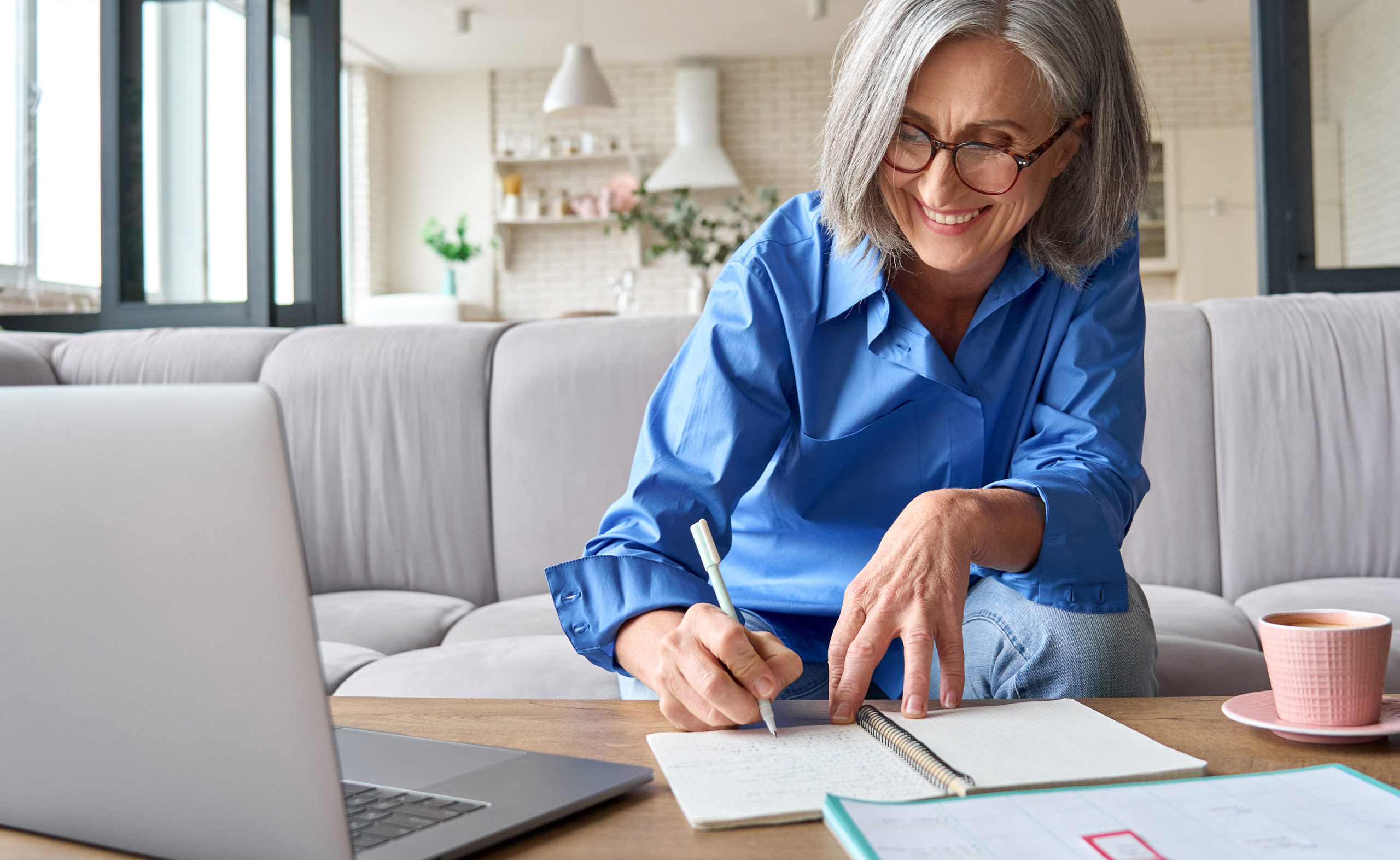 Mature senior woman is having e learning remote class.